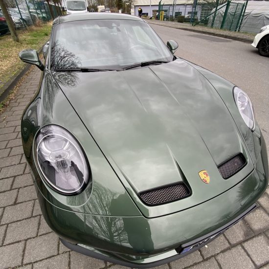 Hand wash for Oak Green GT3 Touring with custom paint, accompanied by interior detailing.